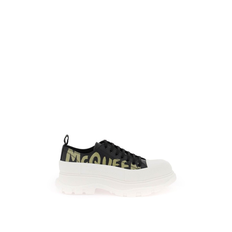 tread slick sneakers with graffiti logo