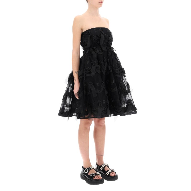 tulle dress with bows and embroidery.