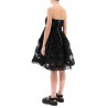 tulle dress with bows and embroidery.