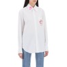 "shirt with flower print patch and embroidered logo