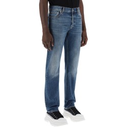 straight leg jeans with faux pocket on the back.