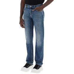 straight leg jeans with faux pocket on the back.