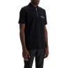 polo shirt with embroidered logo letter