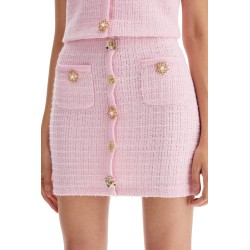 'knitted mini skirt with jewel buttons