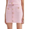 'knitted mini skirt with jewel buttons