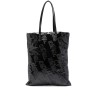 Black embossed leather handbag