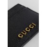 card case with gucci script