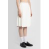 below-the-knee pleated wrap skirt