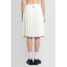 below-the-knee pleated wrap skirt