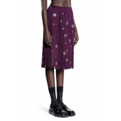 midi-skirt with fringe and grommet embellishment