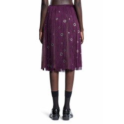 midi-skirt with fringe and grommet embellishment