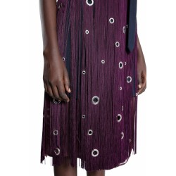 midi-skirt with fringe and grommet embellishment