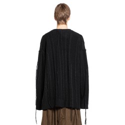 string switching sweater