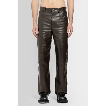 polished leather trousers