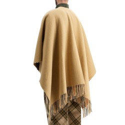 wool cape with fringes.