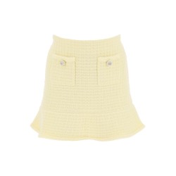 "knitted mini skirt with jewel buttons