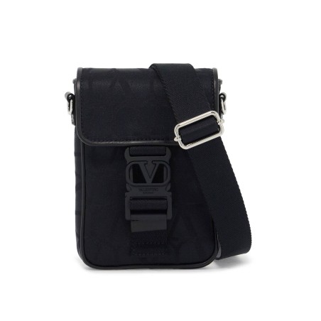 black iconographe mini crossbody bag