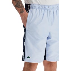 with logo on the bermuda shorts