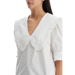 blouse with exaggerated collar and ruffle