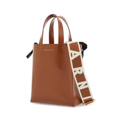 brown calf leather shopping bag with minimalist design and shoulder strap