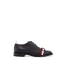 elegant wholecut shoes in black calfskin with rwb bow