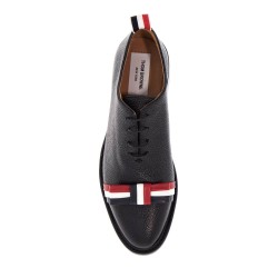 elegant wholecut shoes in black calfskin with rwb bow