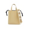 beige leather shopping bag with short handles and shoulder strap