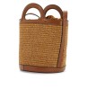 light brown woven fabric and leather bag with circular handles