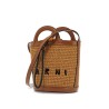 light brown woven fabric and leather bag with circular handles