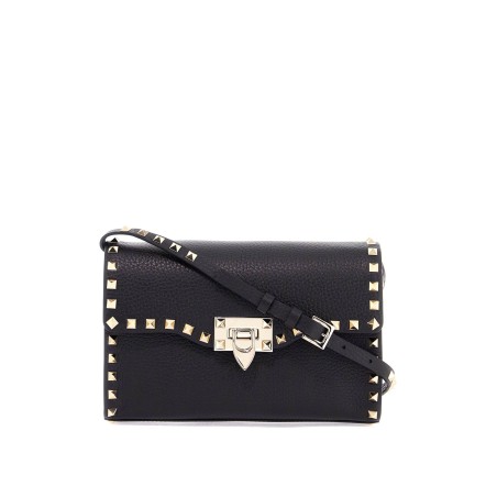 small black leather shoulder bag with golden studs