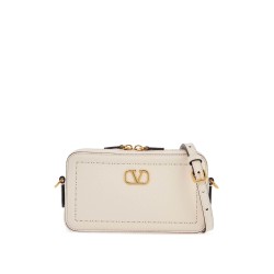 mini camera case in ivory leather with adjustable strap and golden details