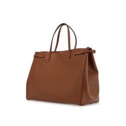 borsa tote grande in pelle marrone minimalista con fibbie decorative