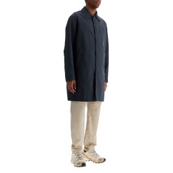 long blue waterproof coat in high-quality polyester with buttons