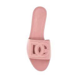 flat slipper in pink calfskin with embossed dg logo