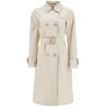 beige cotton double-breasted trench coat with adjustable sleeves