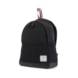 black multipocket backpack in polyester and leather with adjustable straps