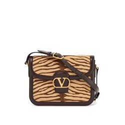 beige and dark brown striped leather shoulder bag