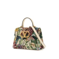 small floral multicolor handbag with adjustable shoulder strap