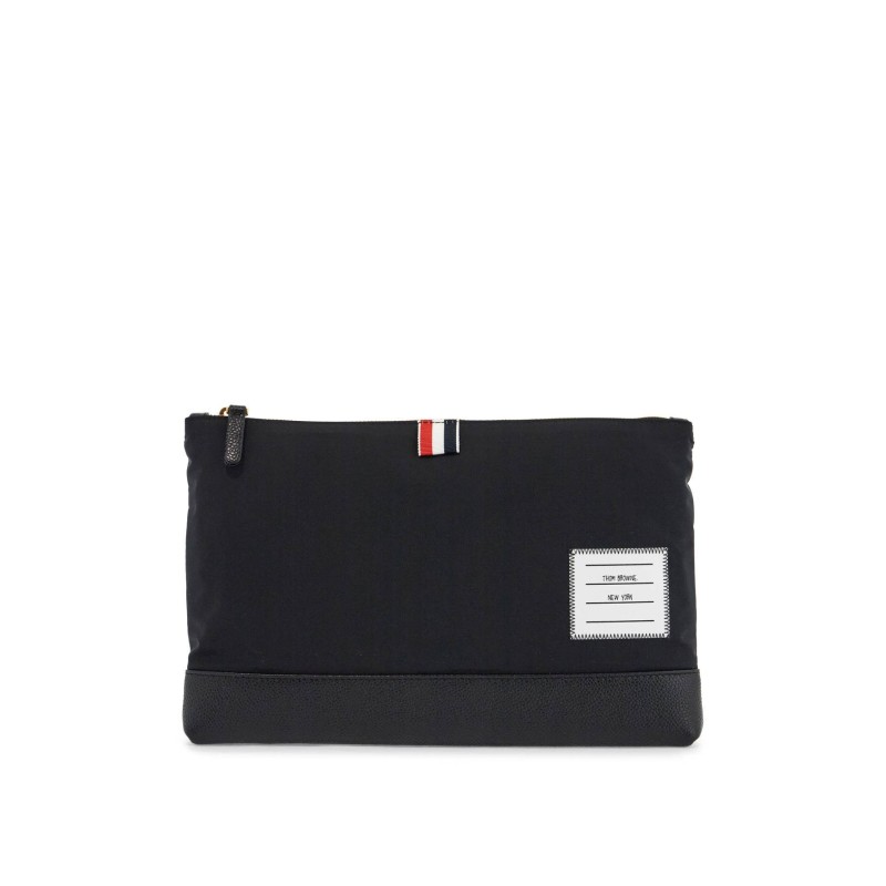 large pouch with gold zip and black tricolor stripe