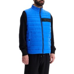 bright blue quilted gilet with high collar and zip