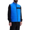 bright blue quilted gilet with high collar and zip