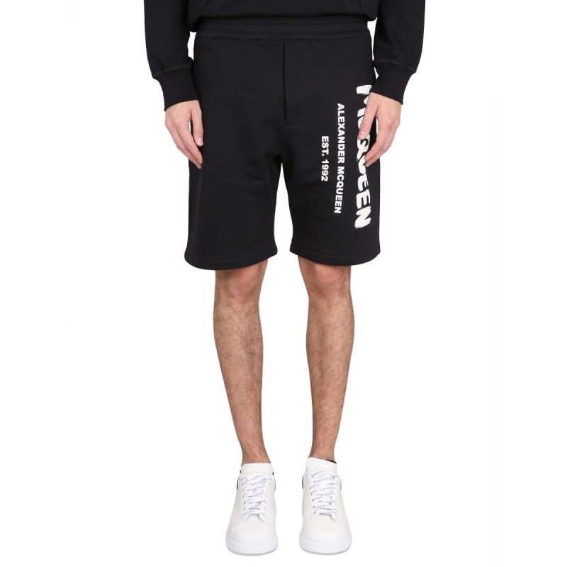 BERMUDA SHORTS WITH GRAFFITI LOGO PRINT