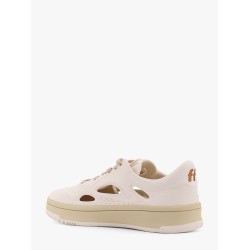 Low-top foam sneakers with lateral openwork