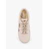 Low-top foam sneakers with lateral openwork