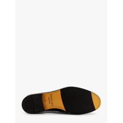 Leather loafer with iconic tassels