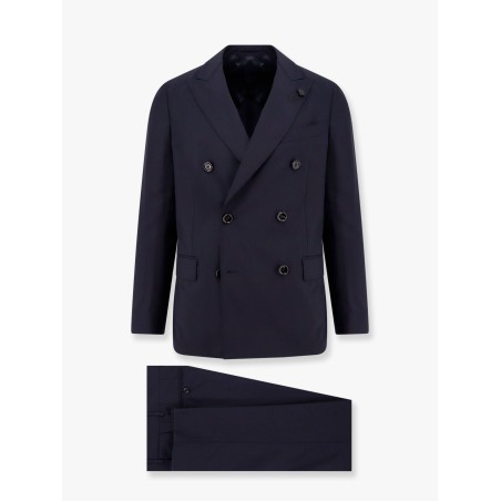 Double-breasted wool suit with iconic brooch