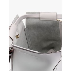 Leather handbag with frontal logo patch
