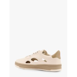 Low-top sneakers realized with foam with lateral openwork