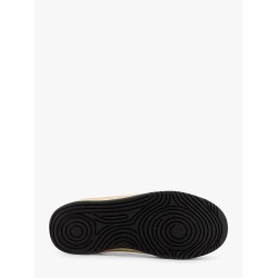 Low-top sneakers realized with foam with lateral openwork