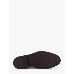 Suede loafer with iconic tassels